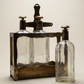 Antique Three Bottle Tantalus Liquor Set with Brass Stand