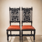 Pair of Antique Jacobean Revival Carved Oak Hall Chairs with Heraldic Crest Backs & Leather Seats