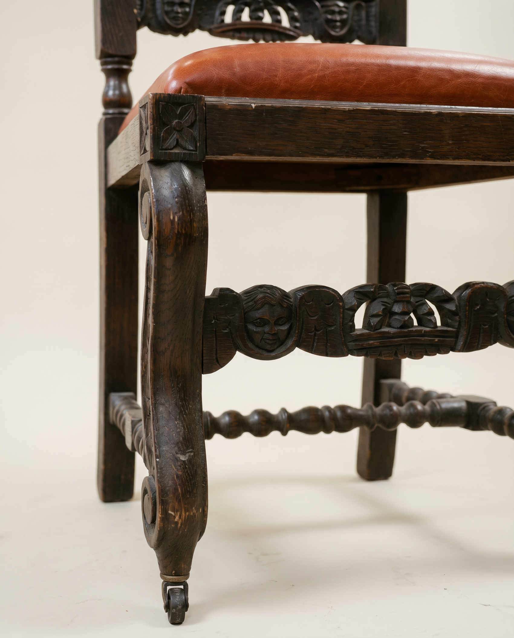 Pair of Antique Jacobean Revival Carved Oak Hall Chairs with Heraldic Crest Backs & Leather Seats