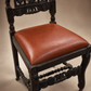 Pair of Antique Jacobean Revival Carved Oak Hall Chairs with Heraldic Crest Backs & Leather Seats