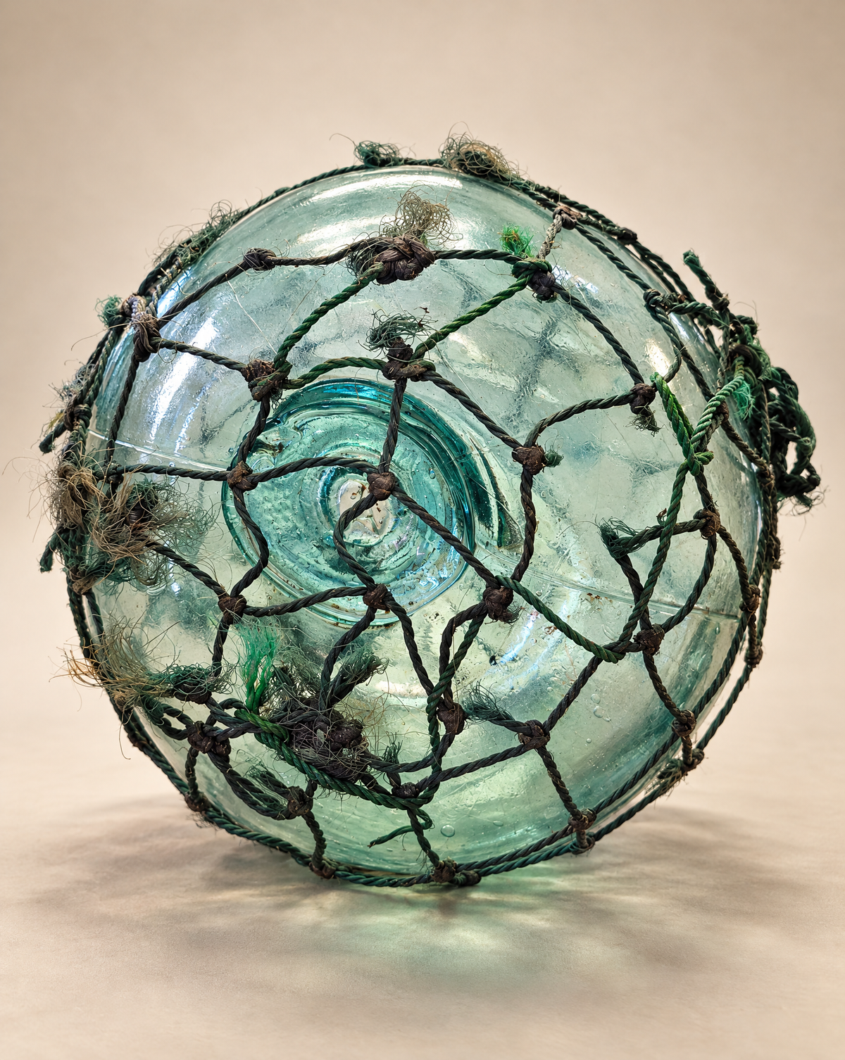 Vintage Glass Fishing Float with Rope Netting