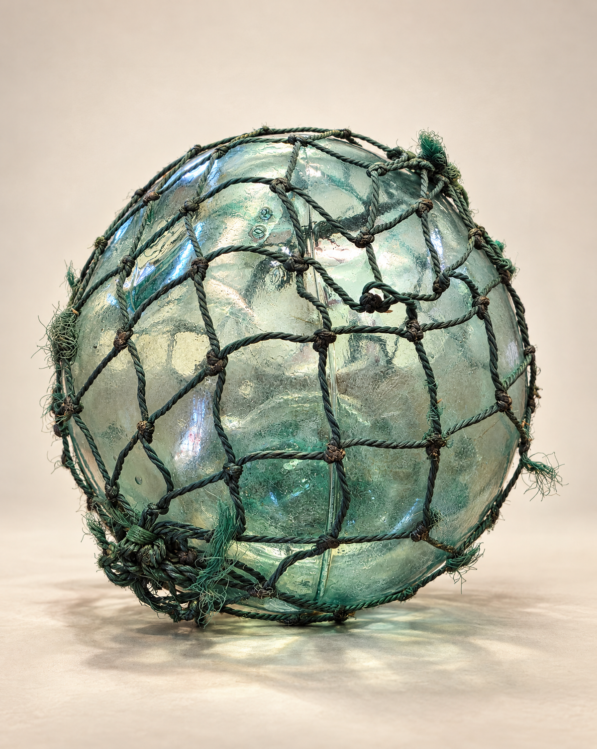 Vintage Glass Fishing Float with Rope Netting