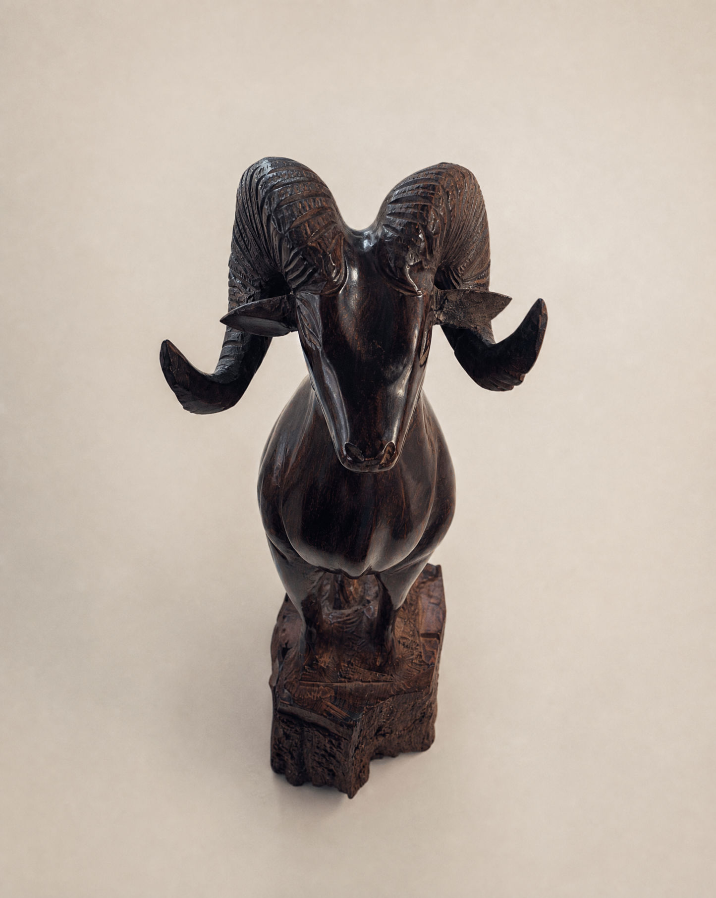 Hand-Carved Ram Sculpture on Natural Wood Base