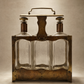 Antique Three Bottle Tantalus Liquor Set with Brass Stand