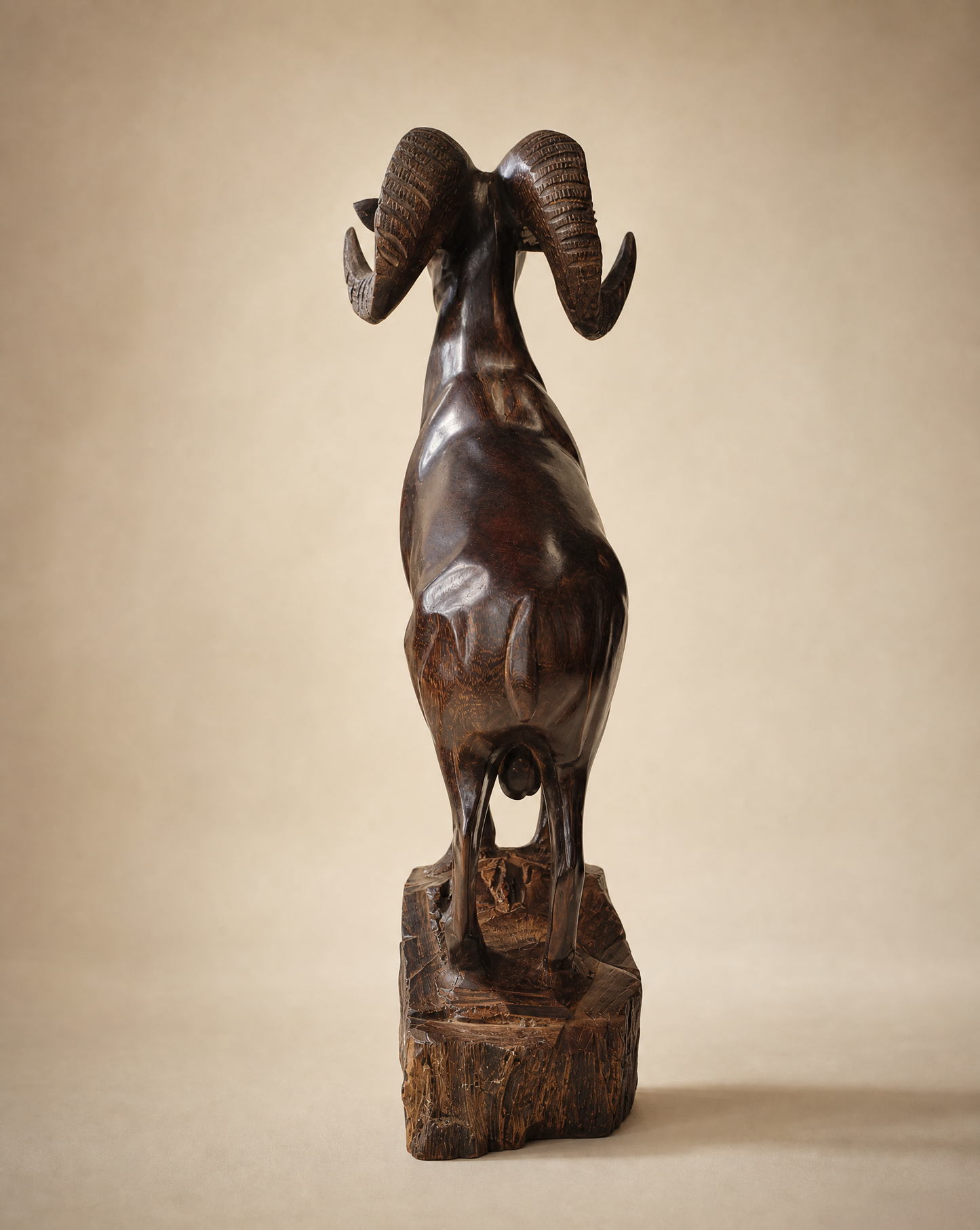 Hand-Carved Ram Sculpture on Natural Wood Base