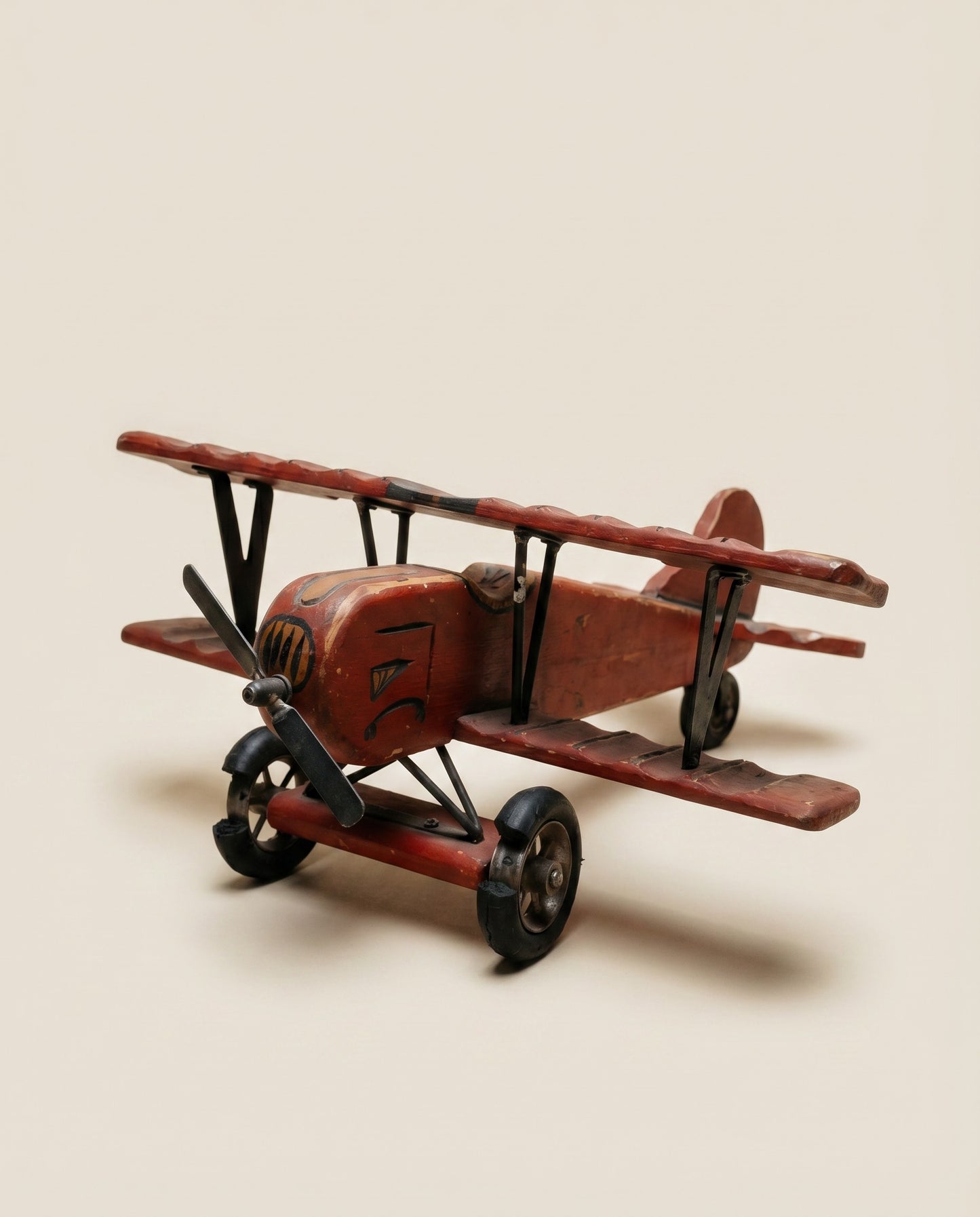 Vintage Hand-Painted Wooden Biplane Toy with Rolling Wheels