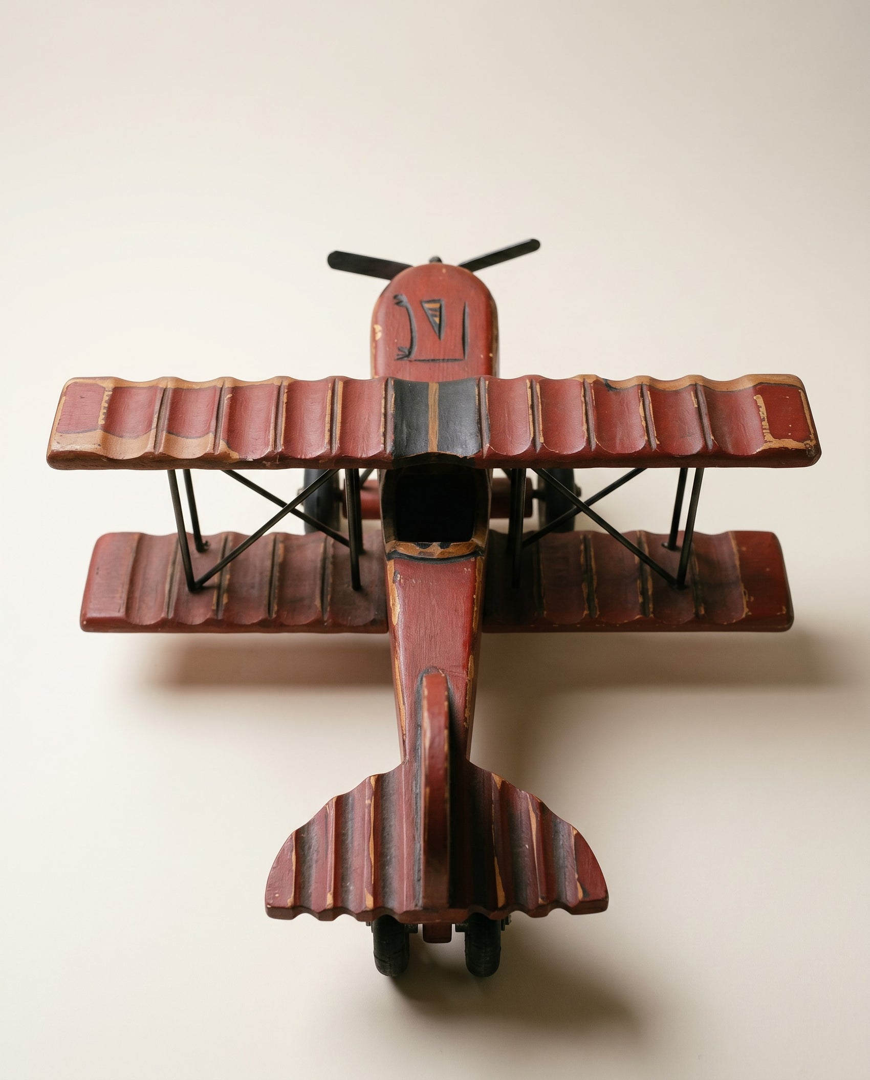 Vintage Hand-Painted Wooden Biplane Toy with Rolling Wheels