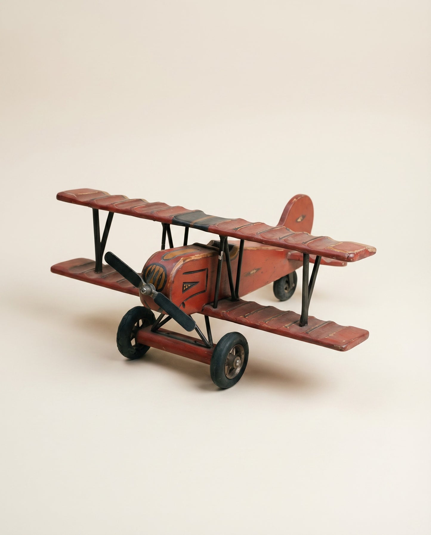 Vintage Hand-Painted Wooden Biplane Toy with Rolling Wheels