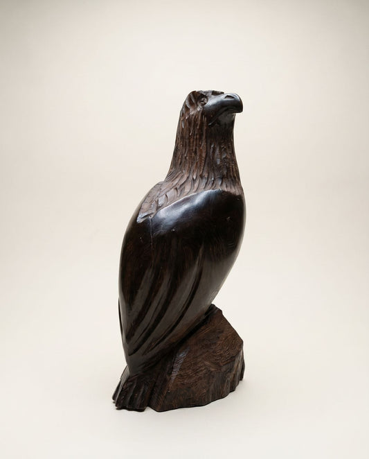 Hand-Carved Wooden Eagle Sculpture on Natural Wood Base