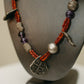 Hand-Strung Tribal Amulet & Silver Charm Necklace