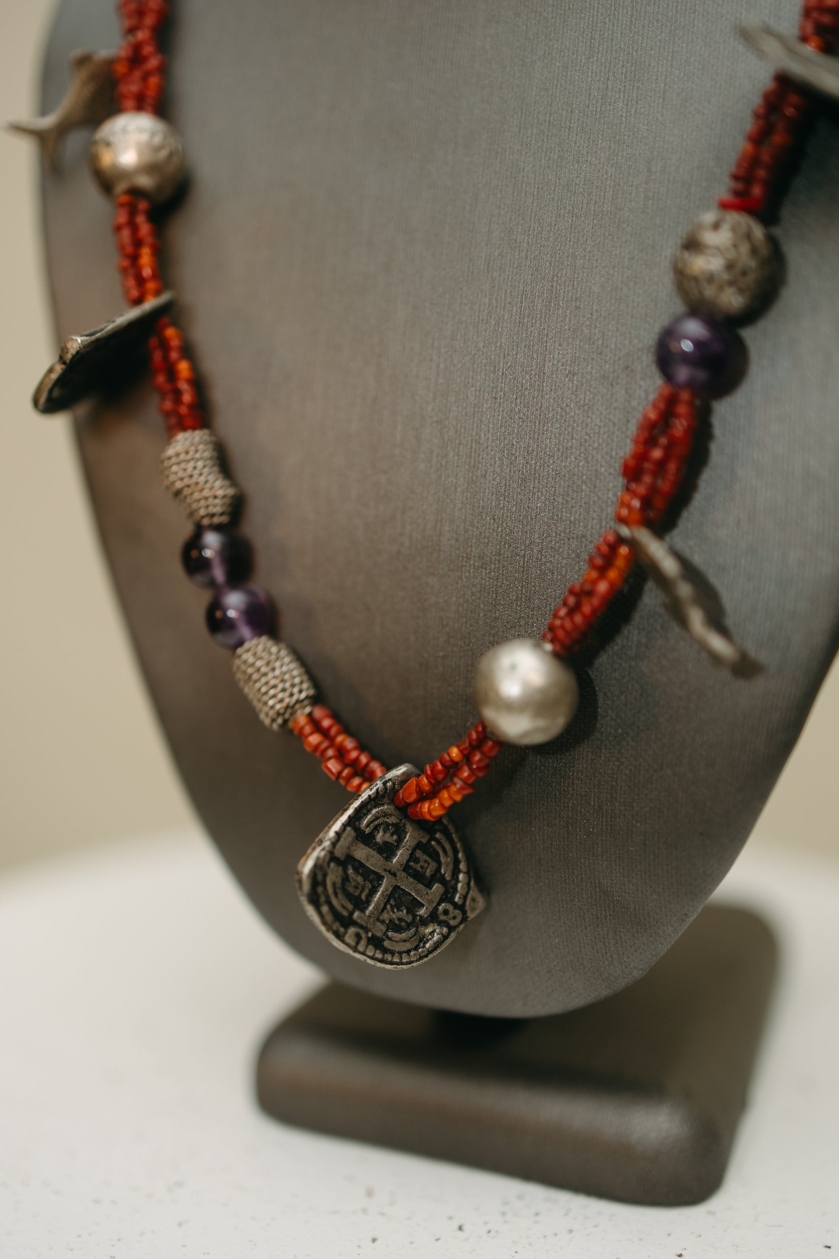 Hand-Strung Tribal Amulet & Silver Charm Necklace