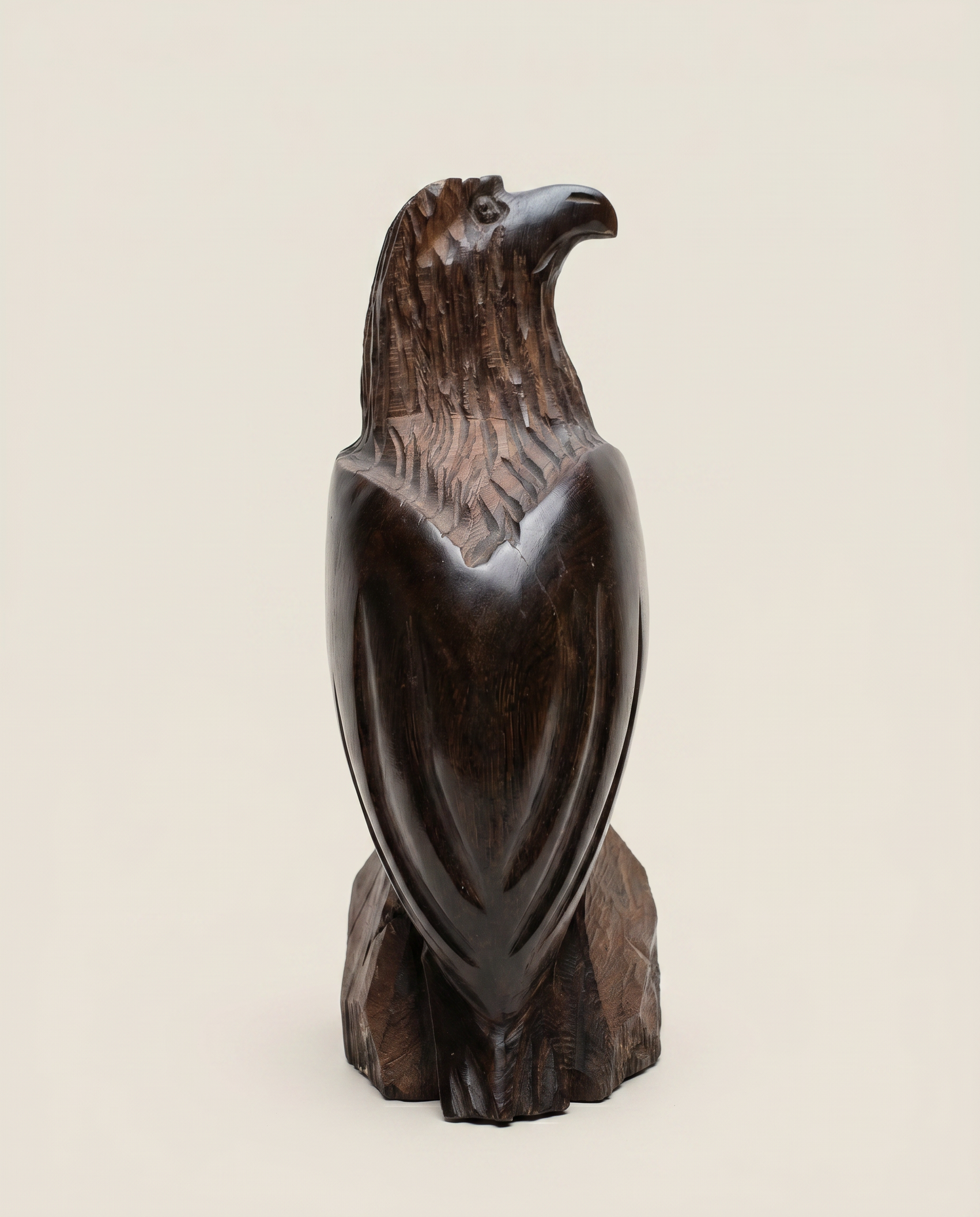 Hand-Carved Wooden Eagle Sculpture on Natural Wood Base