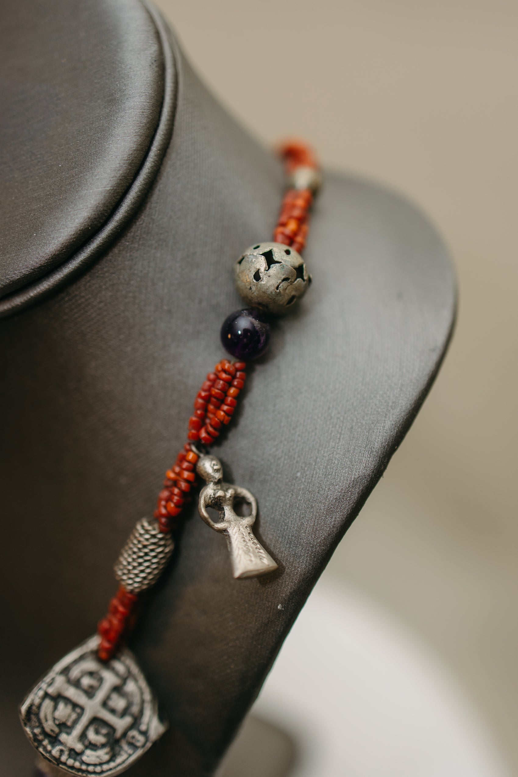 Hand-Strung Tribal Amulet & Silver Charm Necklace