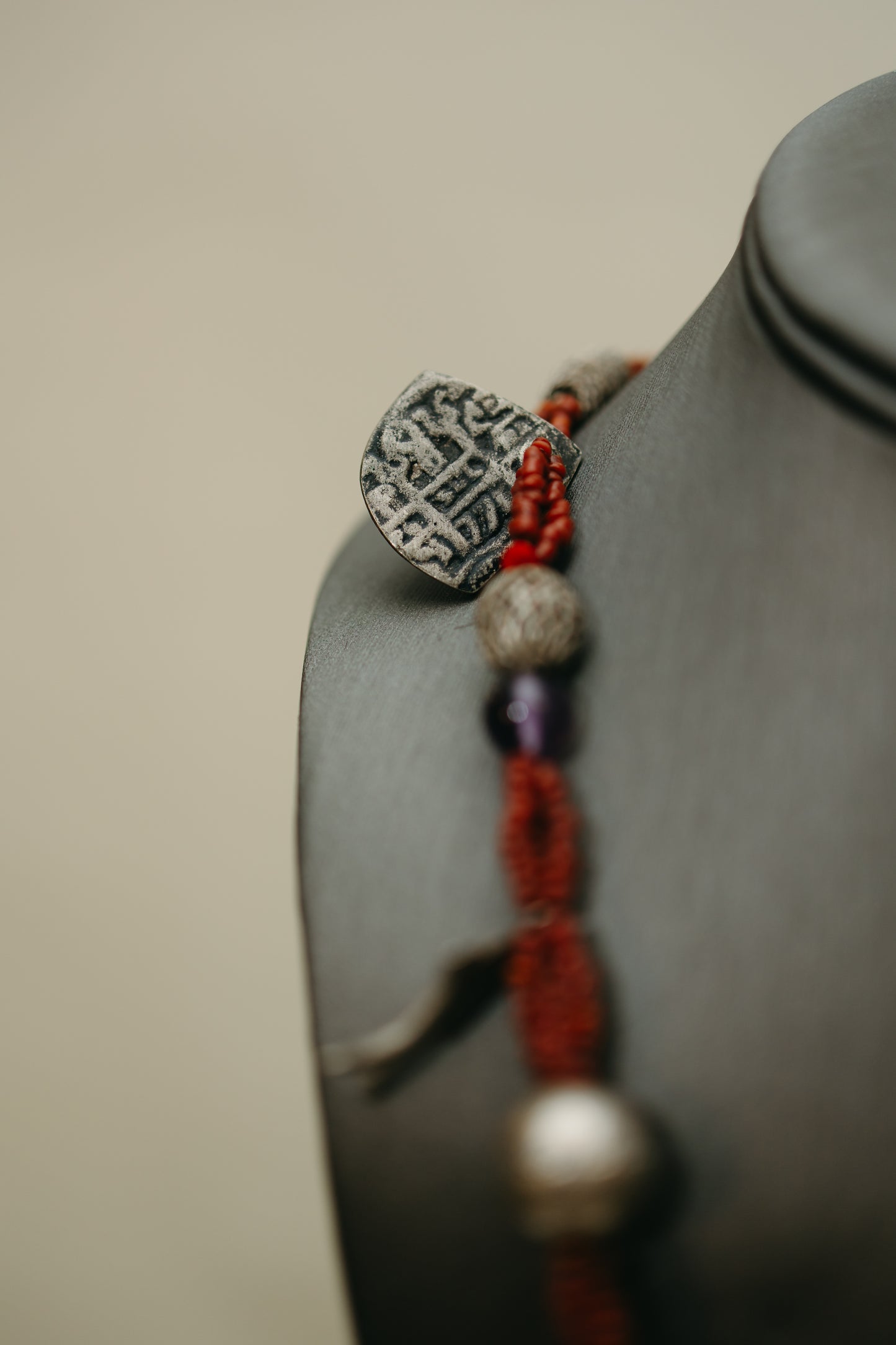 Hand-Strung Tribal Amulet & Silver Charm Necklace