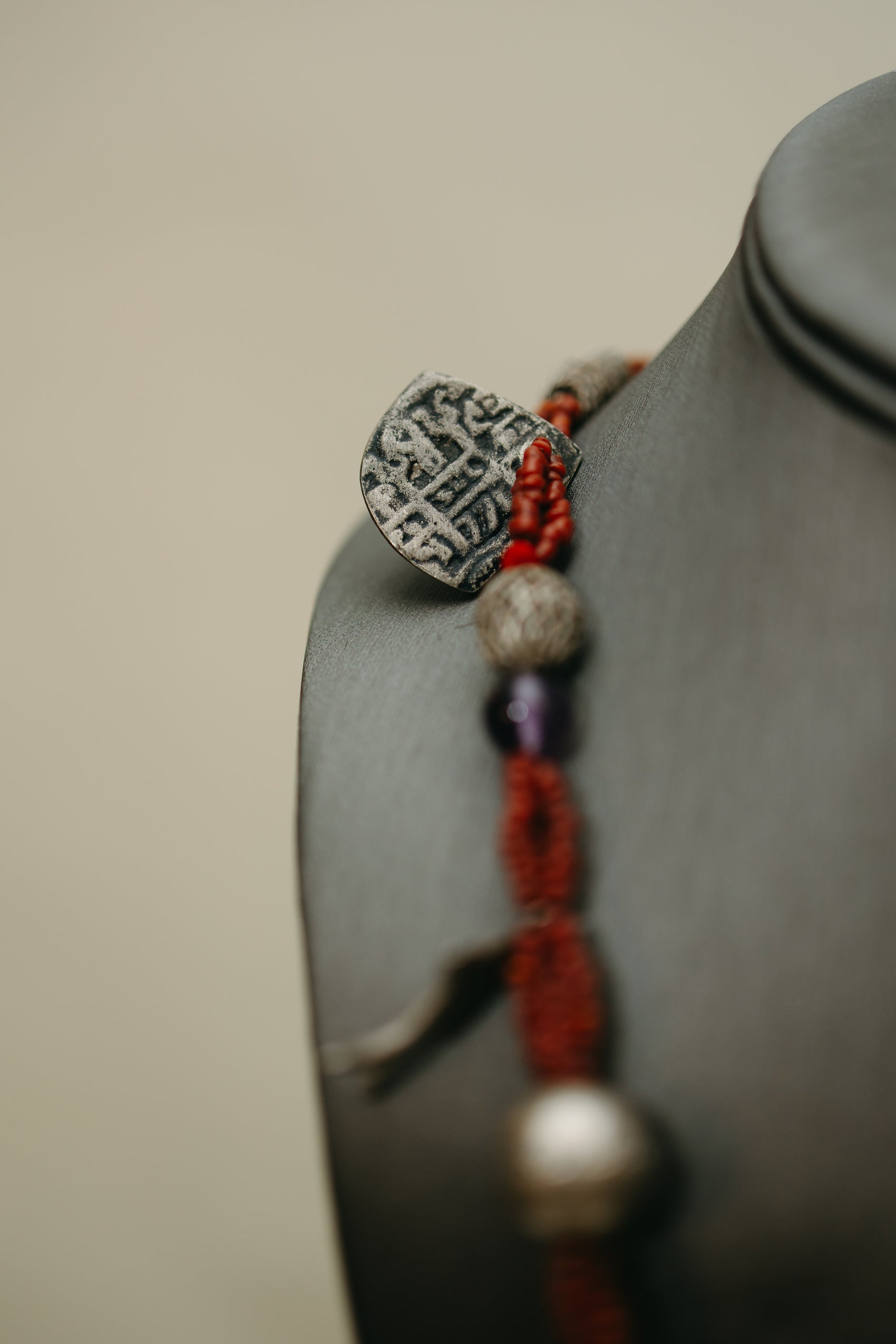Hand-Strung Tribal Amulet & Silver Charm Necklace