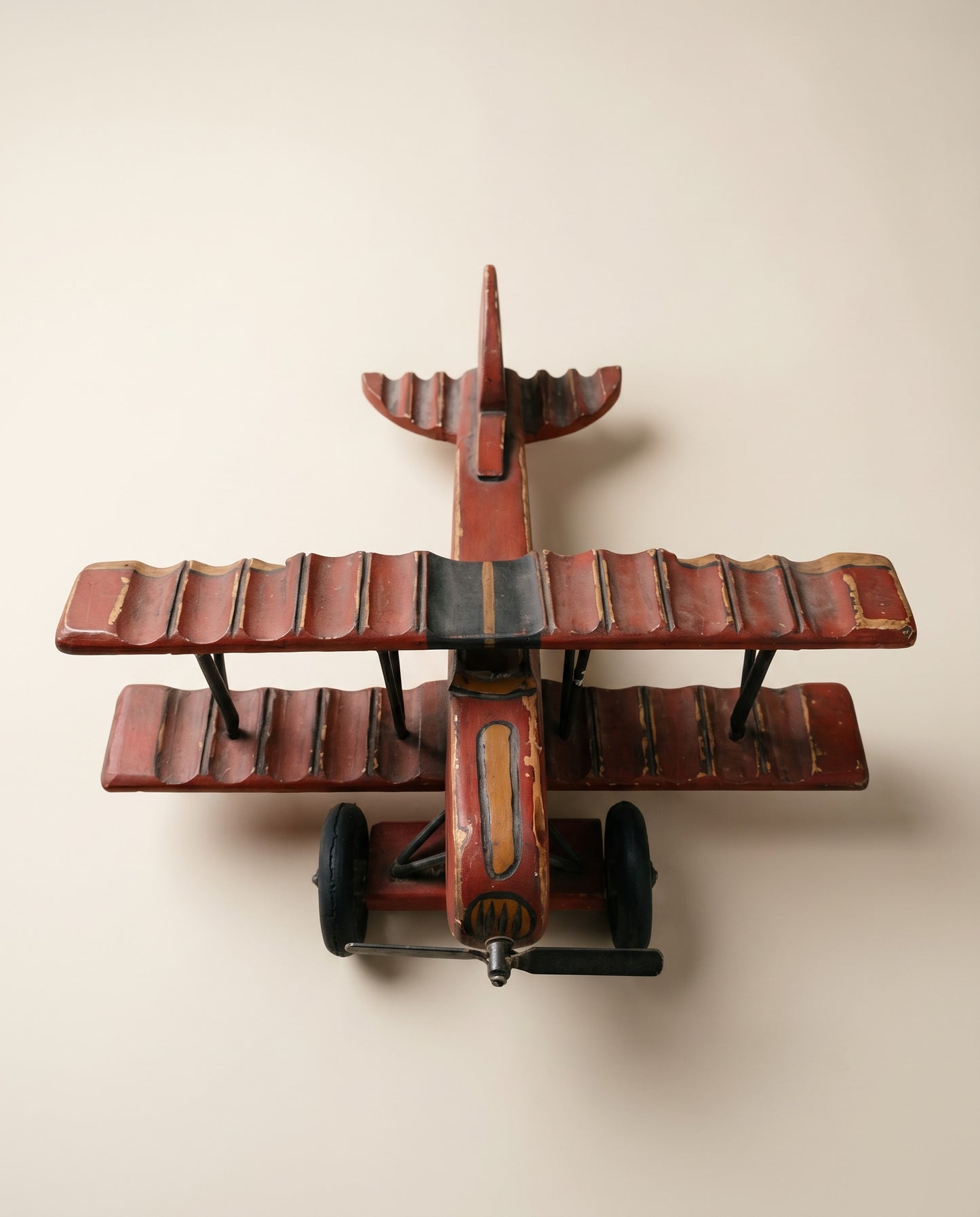Vintage Hand-Painted Wooden Biplane Toy with Rolling Wheels