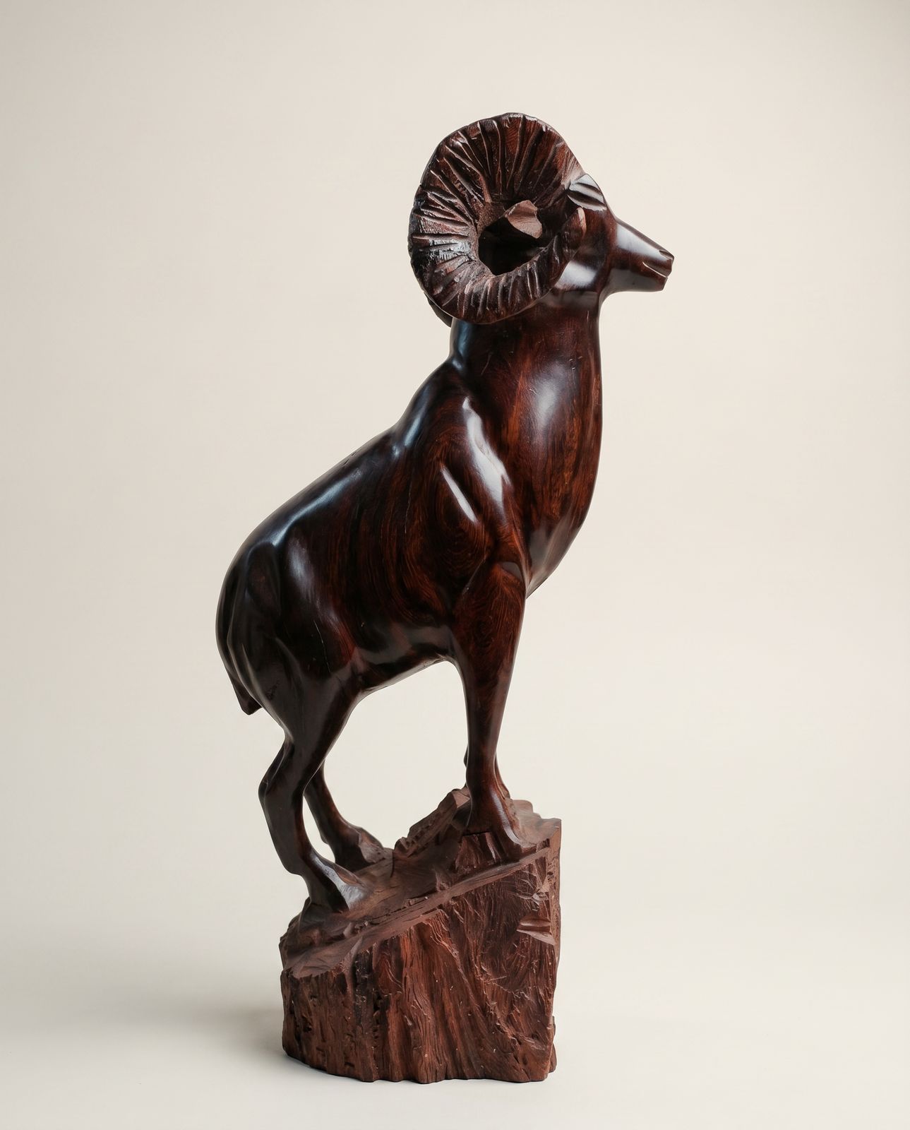 Hand-Carved Ram Sculpture on Natural Wood Base