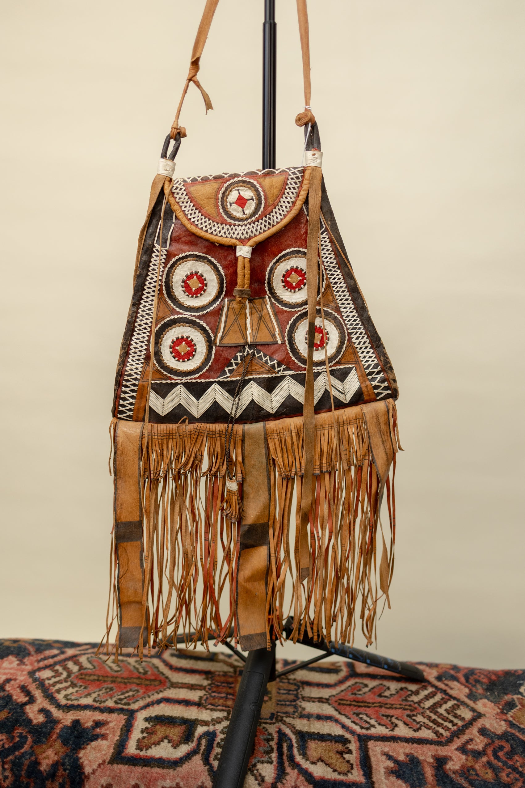 Handcrafted Leather Tribal Fringe Bag with Geometric Embroidery