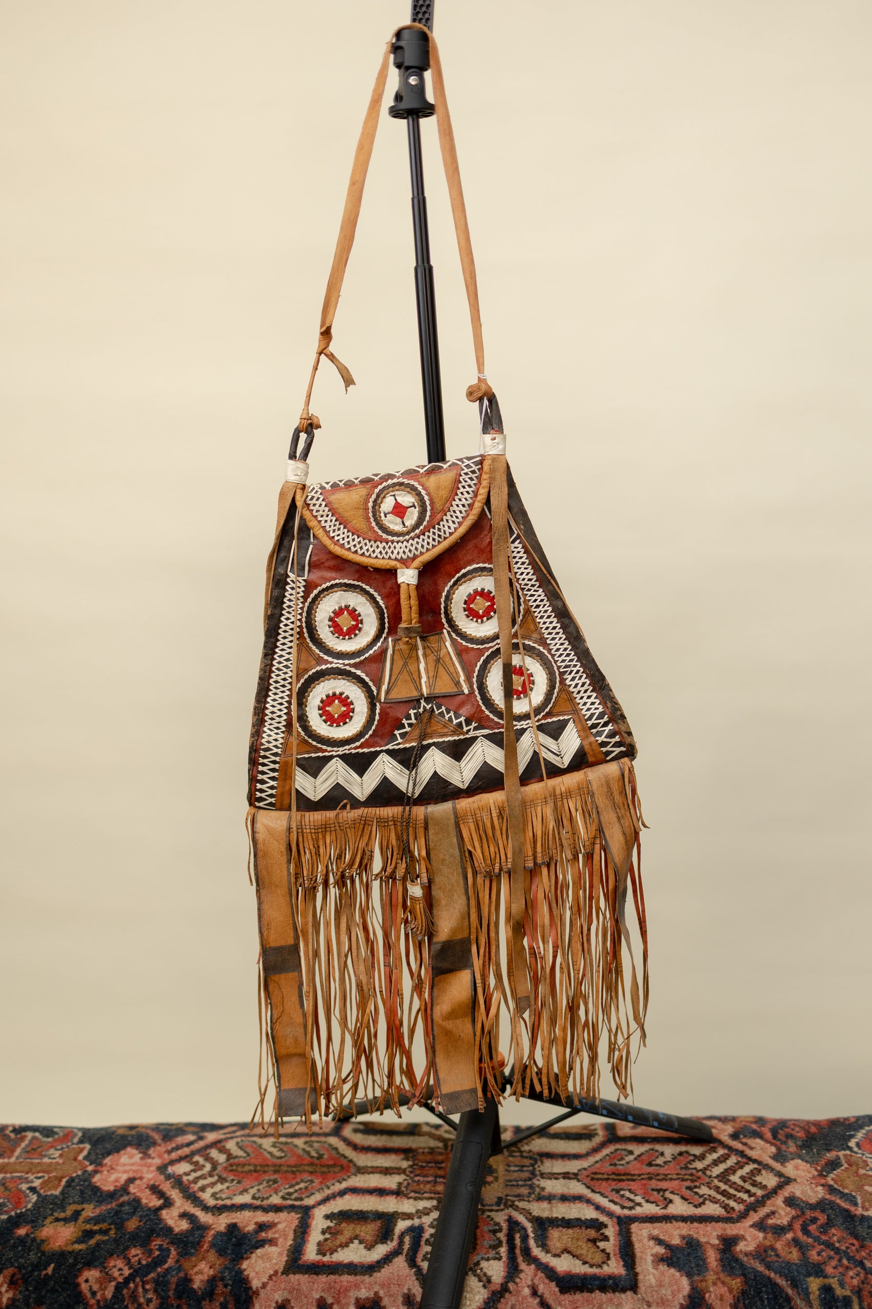 Handcrafted Leather Tribal Fringe Bag with Geometric Embroidery