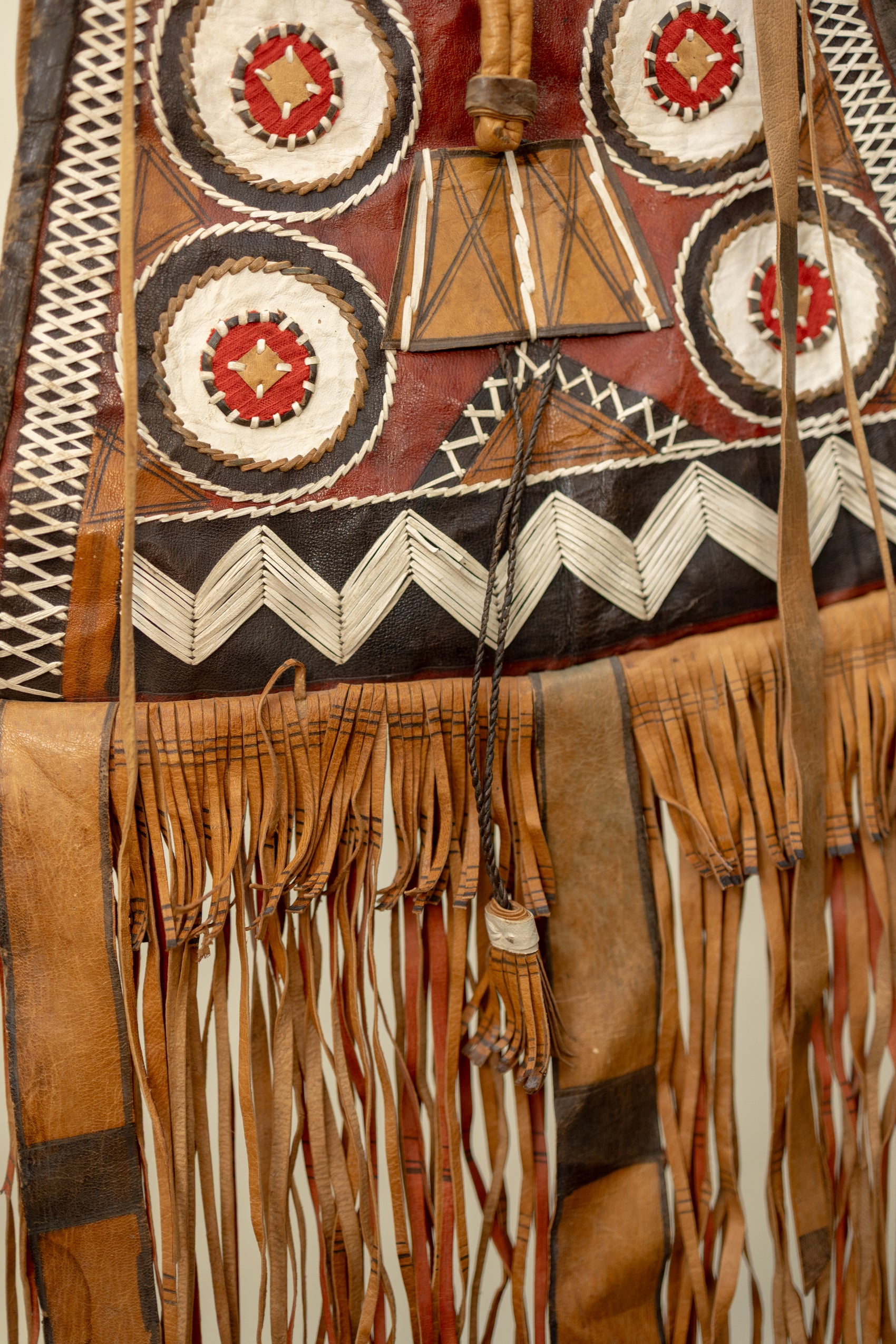Handcrafted Leather Tribal Fringe Bag with Geometric Embroidery