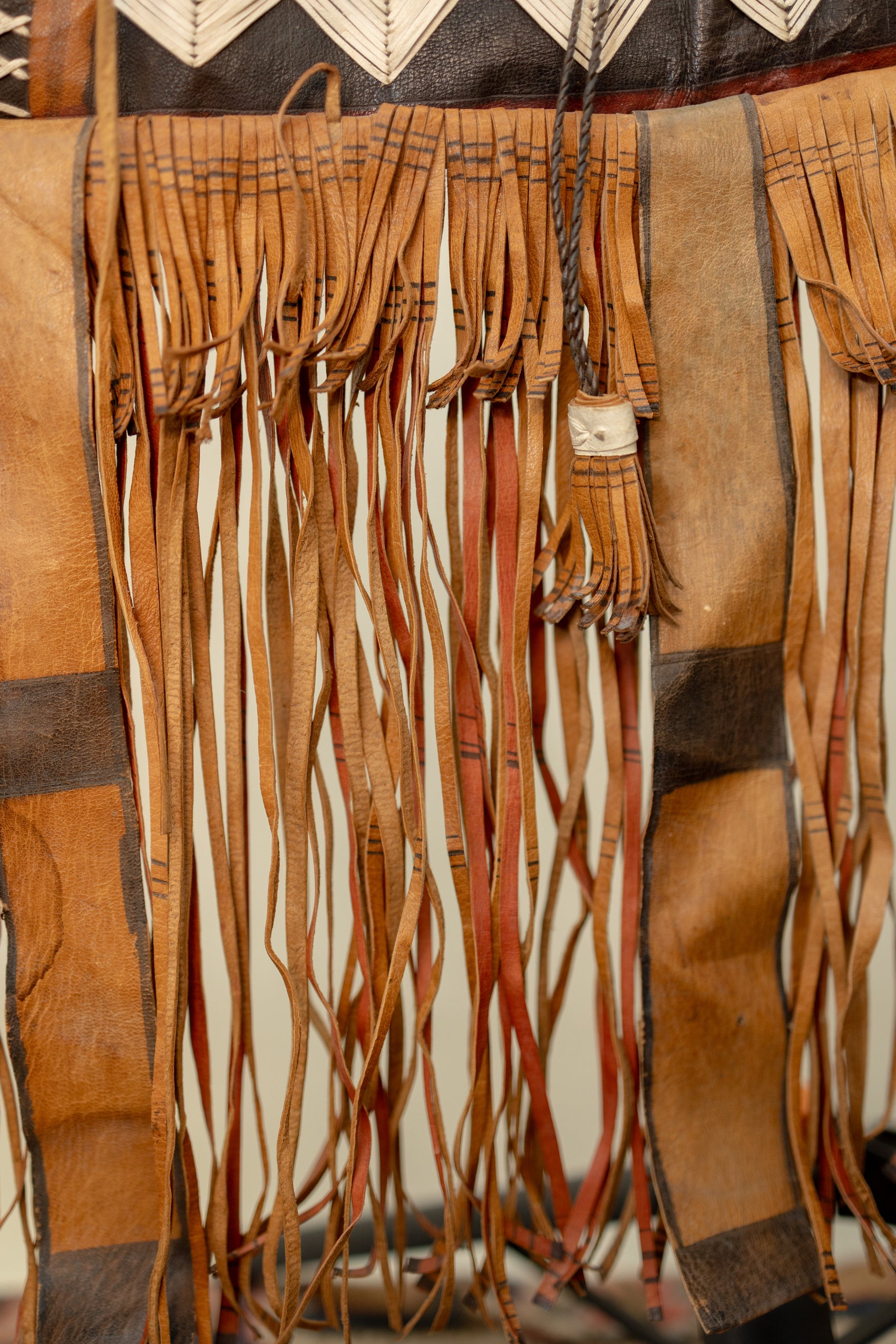 Handcrafted Leather Tribal Fringe Bag with Geometric Embroidery
