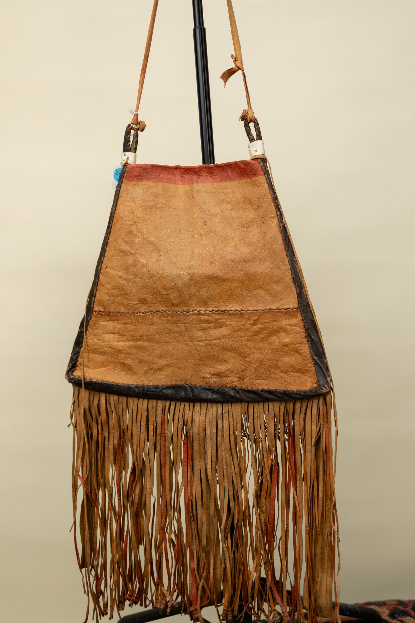 Handcrafted Leather Tribal Fringe Bag with Geometric Embroidery